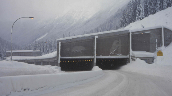 Colour photo of mountain pass snowshed in winter.